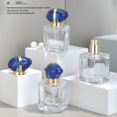 China Sapphire Cap Cosmetic Container Travel Portable Atomizer Glass Spray 30ML Clear Perfume Bottle for sale