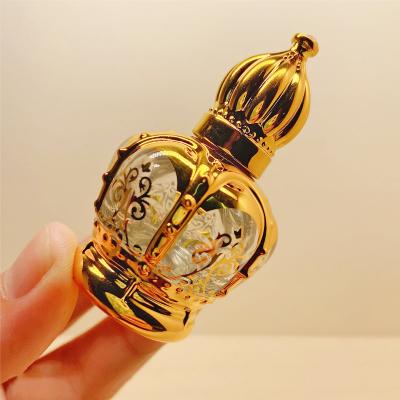 China 12ml Essential Oil Cosmetic Roller Bottle Gold Crown Shape Plated Portable Travel To Cut Out Glass Luxury Empty Perfume Bottle for sale