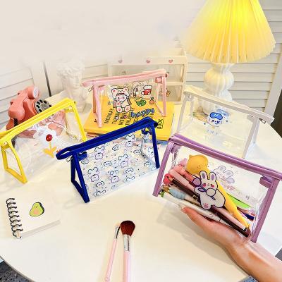 China Durable Cartoon transparent PVC pen bag wholesale Japanese large capacity students pencil bag junior high school stationery storage bag for sale