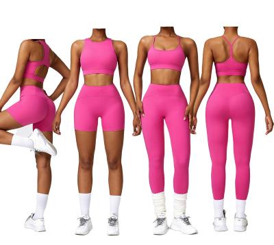 China Breathable environmental  Recycled Nylon Spandex 4 Piece Women Athletic Wear Apparel Running Sports Suit Bra Shorts Leggings Yoga Set for sale