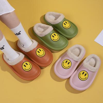 China Cute Cartoon Popular Furry Smiley Face Cute Cartoon Popular Casual Warm Cotton Home Ladies Lovers Fluffy Slippers for sale