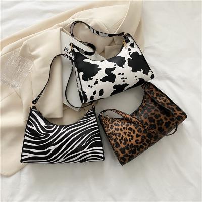 China Simple Black Leather Lady Leopard Print PU Ladies Fashion Shoulder Bag OEM ODM ODM Zebra For Girls Armpit Handbag Accept for sale