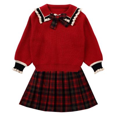 China Elastic Waist Plaid Sweater Polyester Fiber Vertical Color Bow Lapel Large Size Knitted Striped Knitted Hit Bottom Skirt Suit for sale