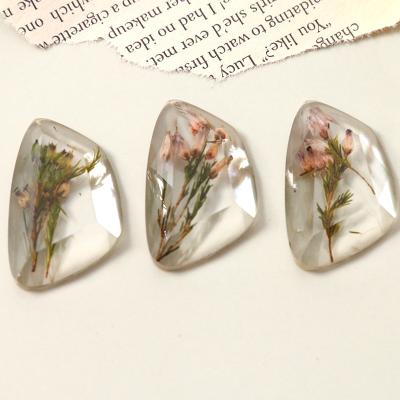 China Daffodil Flower Resin Flatback Accessories 100PCS Hong Kong Style Transparent Dried Earring DIY Phone Shell and Cabochon For Phone Case Drop Earring Jewelry Making for sale