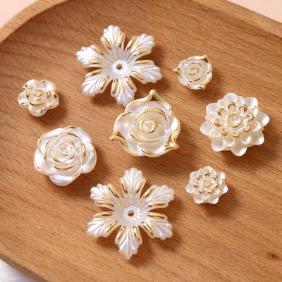 China DIY Jewelry Making Earring Accessories 100pcs Phnom Penh Imitation Snowflake Rose Flowers DIY Flatback Pearl Bead For Earring Charms Phone Case Making for sale