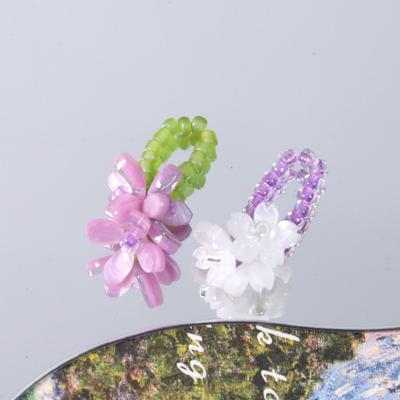 China 100Pcs Popular Style Flower Summer DIY Handwoven Glass Bead Ring For Hand Accessories Jeweiry Making for sale