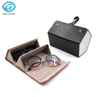 China Portable 2 Folding Sunglasses Space Saving PU Folding Slot Travel Glasses Display Storage Case for sale