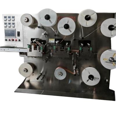 China Machinery & Hardware high-efficiency band-aid synthesize for producing medical non woven fabric , spraying and packaging, make band-aid synthesizer for sale