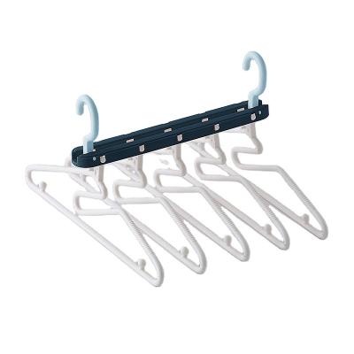 China Fashion 5 in 1 Non Slip Magic Organizer Scarf Cloth Rack Space Saving Hanger Plastic Foldable Hangers for sale