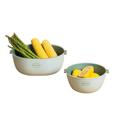 China Sustainable Creative Kitchen Tools Wash Fruit Down Nordic Color Double Hit Drain Basket for sale