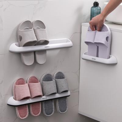 China Sustainable Bathroom Slippers Rack Wall Mounted Plastic Storage Rack Single Shoe Toilet Double Row Japanese Slippers Rack for sale