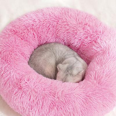 China Comfortable Washable Soft Faux Fur Donut Dog Cat Bed For Large Dog Warm Round Customized Soothing Fluffy Plush Dog Bed for sale