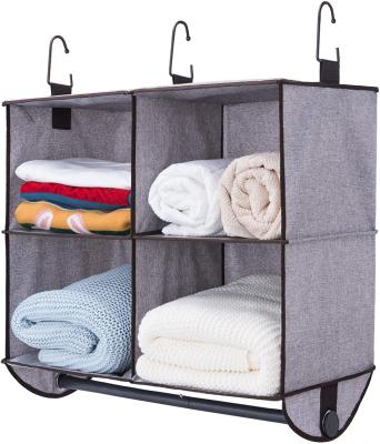 China Customization Minimalist Home Waterproof Fabric Closet Clothes Organization Shelf 4 Compartments Hanging Storage Organizer for sale