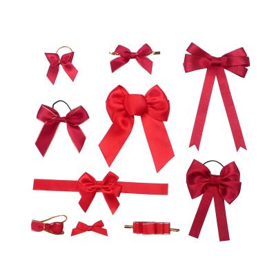 China Vivid Color Stability Huihuang Various Bow Types Custom Red Fragrance Gift Wrapping Wine Bottle Hanger Wholesale for sale