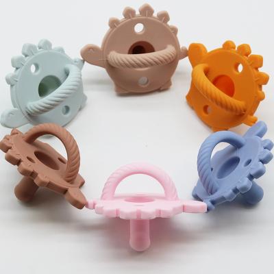 China BPA Free Factory Design Food Grade Baby Dinosaur Silicone Wholesale Customized Pacifier for sale