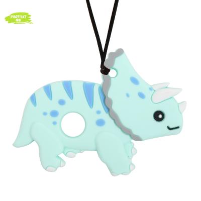 China Safety Bpa Free Cute Dinosaur Chew Necklace Sensory Baby Teething Toy Pendant Silicone Teether for sale