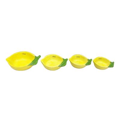 China Viable Hand Painted Ceramic Lemon Shape Measuring Cups and Spoon Kitchen Coffee Cake Measuring Cups Set for sale