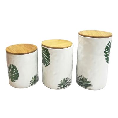 China Wholesale Cheap Microwavable Storage Jar Intaglio Embossing Ceramic Canisters Sets For Kitchen Countertop Decor for sale