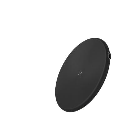 China Convenient high quality round ultra-thin supports a variety of models smart portable 15w wireless charging phone holder for sale