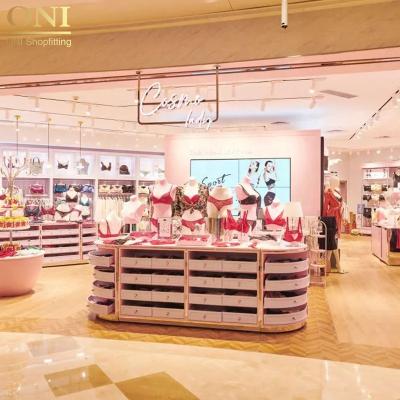 China Durable Retail Wall Display Systems For Girl Lingerie Clothing Store Furniture Underwear Shop Design for sale