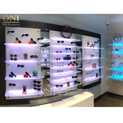 China Durable Optical Shop Fixtures Retail Store Interior Design Retail Optical Frame Wall Mounted Displays for sale