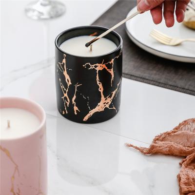 China Antique Cheap Price Home Antique Fancy Gold Crackle Style Decoration Matte Black Ceramic Candle Jar for sale