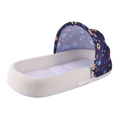 China Comfortable Cartoon Baby Crib Toddler Crib Portable Bed for Newborn with Mosquito Net Foldable Baby Crib Nest for sale