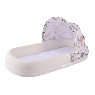 China Environmental Material Portable Cozy Portable Baby Crib Folding Baby Crib Mobile Foldable Nest for sale