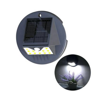 China Unique Solar Outdoor Garden Fence Security PIR Motion Sensor Wall Light PC Design Solar Light for sale