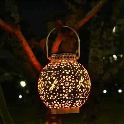 China Holiday Night Quality Outdoor Solar Power Led Outdoor Garden Light Iron Garden Light Newest Cavity Portable Solar Garden Hanging Lantern for sale