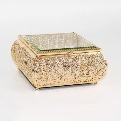 China Luxury Custom Handmade Jewelry Glass Metal Frame Jewelry Box Edge Hardware Handcrafted Gold Metal Feet Box Decorative for sale