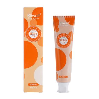 China Customized Orange Fruit Flavor Toothpaste Anti Cavity Freshing Breath for sale