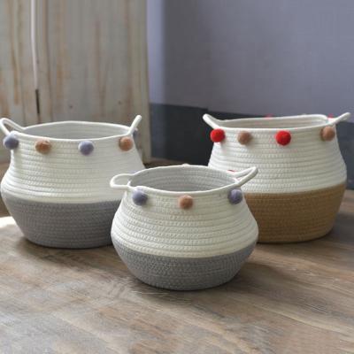 China Sundayhome 2021 Pastoral Small Folding Hanging Hanging Cotton Rope Storage Basket Soft Round Decor Cotton Rope Basket for sale