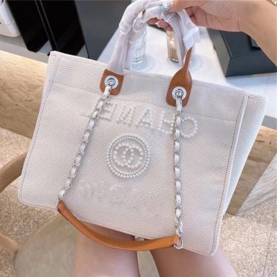 China 2021 luxury beach bag mini backpack policeman small private label designer brand handbags ladies and speedry purse women for sale