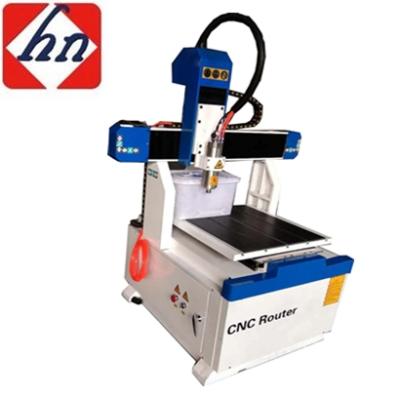 China Jinan Huashinuo Dsp Handle Wooden 3d Mini Cnc Router Working Control System for sale