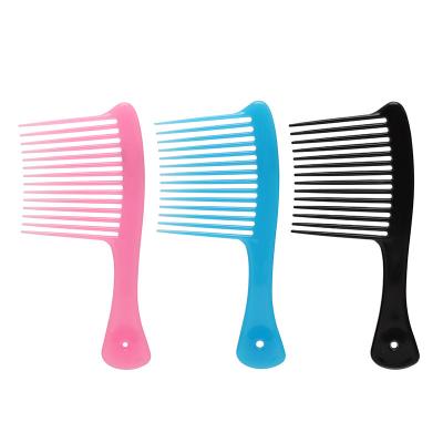 China Cheap and hot selling comfortable large tooth comb household curly hair comb color large dense knife comb for sale