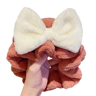 China Cute Hair Band Korean Makeup Korean Convenience Washing Convenience Cartoon Face Bow Plush Hair Band for sale