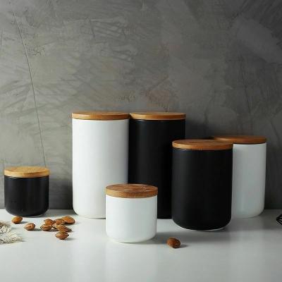 China Best Style Porcelain Canister Canister Viable Coffee Jar Ceramic Sealed Bamboo Cover Sugar Kitchen Organizer for sale