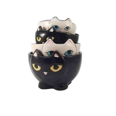 China Viable Ceramic Black And White Cats Nesting Creative Kitchen Decor Measuring Cup Set 4 for sale