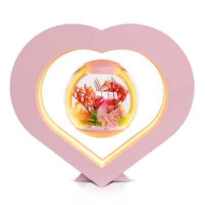 China Heart Shaped Gift Preserved Ornament Creativity Hanging Acrylic Wedding Dried Magnetic Levitation Immortal Flower for sale