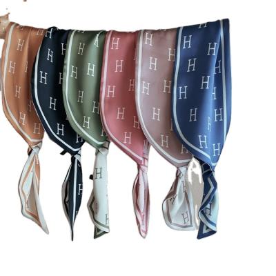 China 2021 Popular New Small Ear Folding Shape Printing Towel Women's Long Digital Fashion All-matching Small Scarf for sale