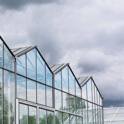 China Automatic Control Intelligent Agricultural Glass Greenhouse For Sale Farm Cooling Shading Irrigation System for sale