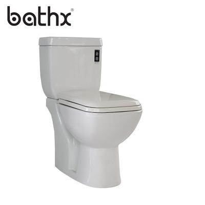 China Modern Ceramic Sanitary Ware Washdown Ceramic WC Double-Flow Style Water Clast Two Piece Toilet for sale