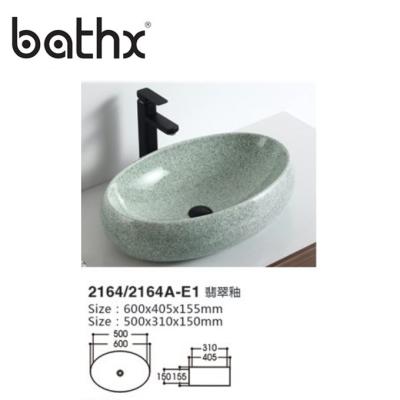 China Modern Style Oval Basin Basin Bowl/Ceramic Basin Rectangular Artistic Bathroom Sink for sale