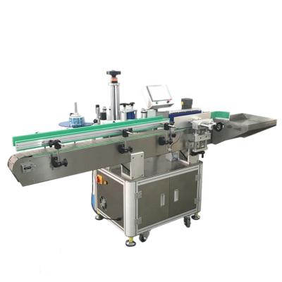 China Full Automatic Food Sticker Perfume Wine Bottle Self Adhesive Labeling Machine For Round Box for sale