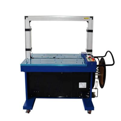 China High Automatic Food Customized PP Table Belt Cardboard Band Strapping Strapping Machine for sale