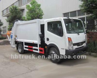 China Nissan Garbage Compactor Truck , Capacity 6-8 m3 vlome 6590*2090*2500mm for sale