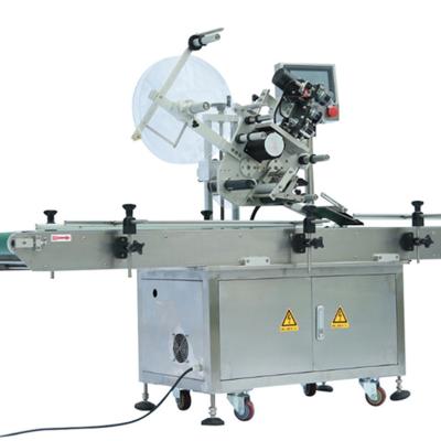 China Automatic food sticker adhesive labling machine/labeling applicator machine for book, carton, small box tea bags for sale