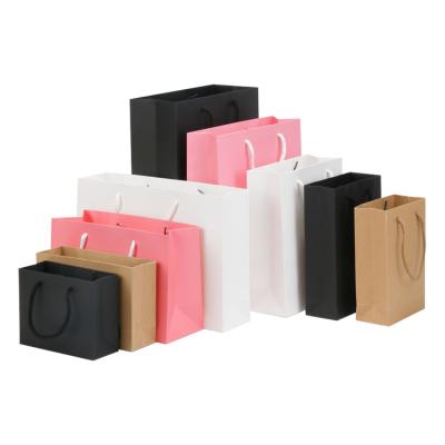 China Recyclable in Stock Wholesale Custom Handle Pink Cardboard Paper Bag Brown White Black Shopping Kraft Paper Bag for Packaging Gift for sale