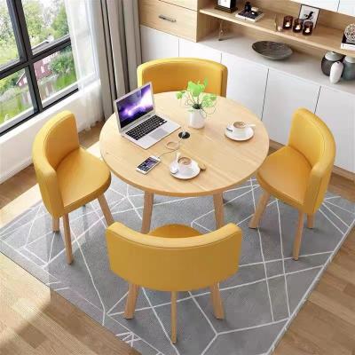 China Other Modern Dining Table Set Faux Leather Dining Chairs 4 Excellent Seat And Wooden Round Dining Table for sale